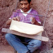Man making a morral, note linking technique (San Andrés Huista)