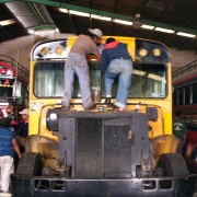 Installing a destination board above the windshield