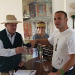 Javier and Cristina Valls tasting the wines of the first vintage in the muraled wine bar of the chateau. The wine is being served by Bruno Coppola, the wine-maker.