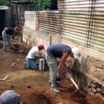 Volunteers helping with the construction of a house in San Juan del Obispo