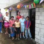 A family from San Miguel Dueñas celebrating their new home