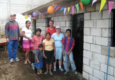 A family from San Miguel Dueñas celebrating their new home