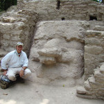 Dr. Hansen with mask on excavated structure