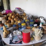 Tools of the trade; gourds, maguey fiber, beads, fabric and feathers (photo Kathryn Rousso)