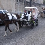 The wedding party arrives to the ceremony in style