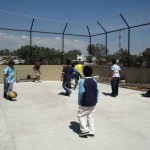 Roof-top recreation deck has plenty of sunshine and excercise/play space