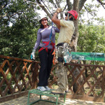 The author prepares to fly along one of the nine zip lines