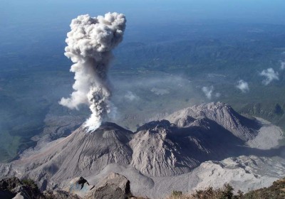 Santiaguito consists of four domes (from left to right): El Caliente (erupts 10-20 times daily), La Mitad, El Monje, El Brujo (photo: R.W. Sanderson)