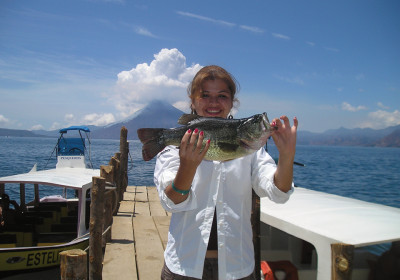 Karla S. is among the many anglers who frequent the Panajachel piers for bass. (photo: Brennan Harmuth)