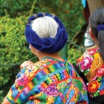Textile motifs celebrate life, showing harmony with nature and the cosmos in symbols such as seeds, rays of the sun, phases of the moon, corn, volcanoes, birds and other animals, water jugs. Vivid colors of the weavings reflect the flowers that abound in Guatemala. (photo by Rudy A. Girón)