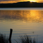 The sun sets on Yaxhá Lagoon (photo by Thor Janson)