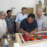 Putting the finishing touches on the stained glass window