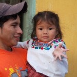 Girl dressed with typical clothing for the Feast of Our Lady of Guadalupe in Antigua Guatemala (photo by Rudy Giron)