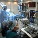 Operating Room technicians check heart position. (photos: Lori Shea)