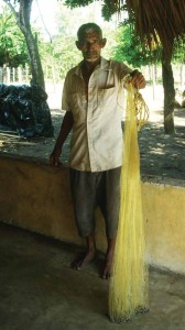 Paustino Cruz Colindres with fishing net