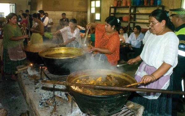 Serving up the Paab’ Ank feast at the old Hermitage of Santo Domingo, Cobán during the August Festival.