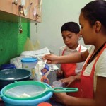 Chef Cindy and prep-cook Marcos