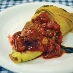 Crepe with chocolate sauce and strawberries