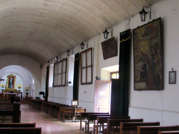 Empty frames remain on the church walls outlining the theft of six precious paintings