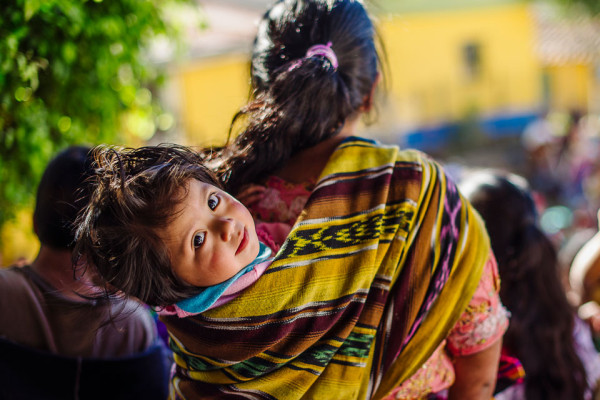 Honorable Mention: theme: Mothers and Children. title: Niña y su madre en reunión de mujeres de la comunidad. place: Lemoa, Chichicastenango. photographer: Jose Fares