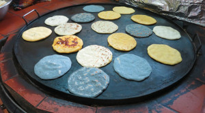 Pupusas are made using black, white and yellow corn dough a la plancha (Kerstin Sabene)