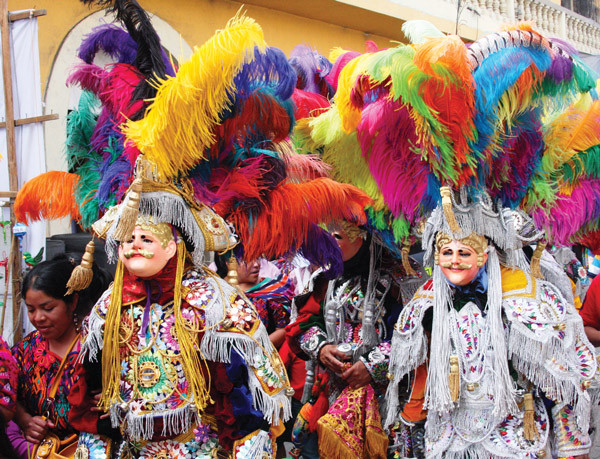Costumed dancers representing Spanish Conquistadors